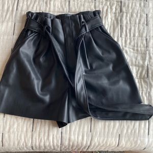 Black leather shorts